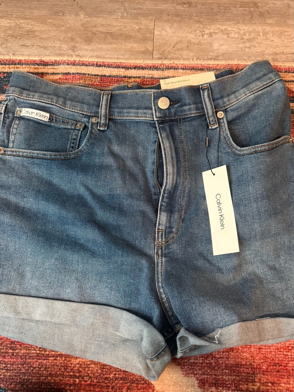 Calvin Klein High Rise Midi Shorts - Light Blue